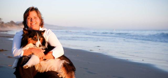 Janet Barr and Her Dog at a Beach